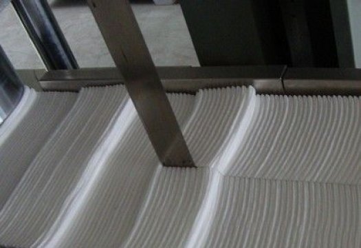 Disposable non-woven towel folding machine